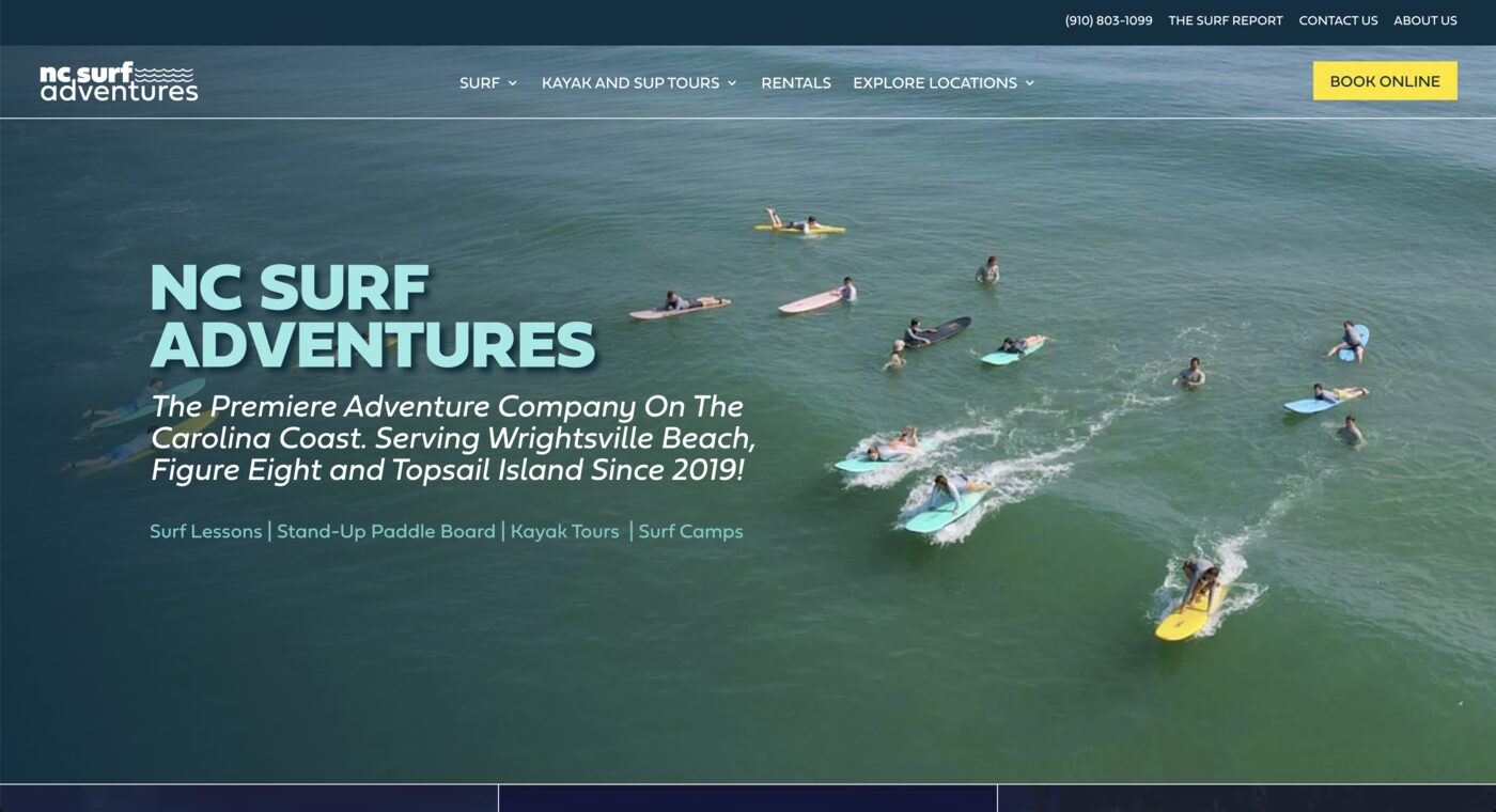 NC Surf Adventures website homepage, showing an aerial photo of surfers in the water with the rebranded logo and navigation.